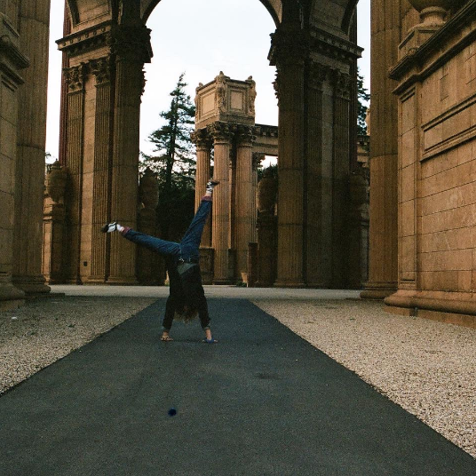 woman doing cartwheel